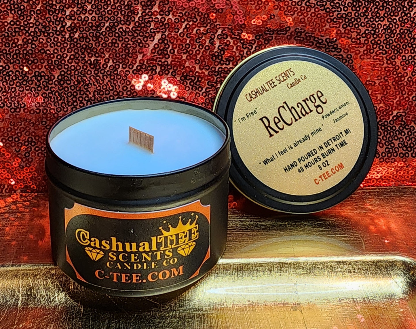 ReCharge candle with baby powder and love spell scent, labeled “I’m Free,” hand-poured in Detroit
