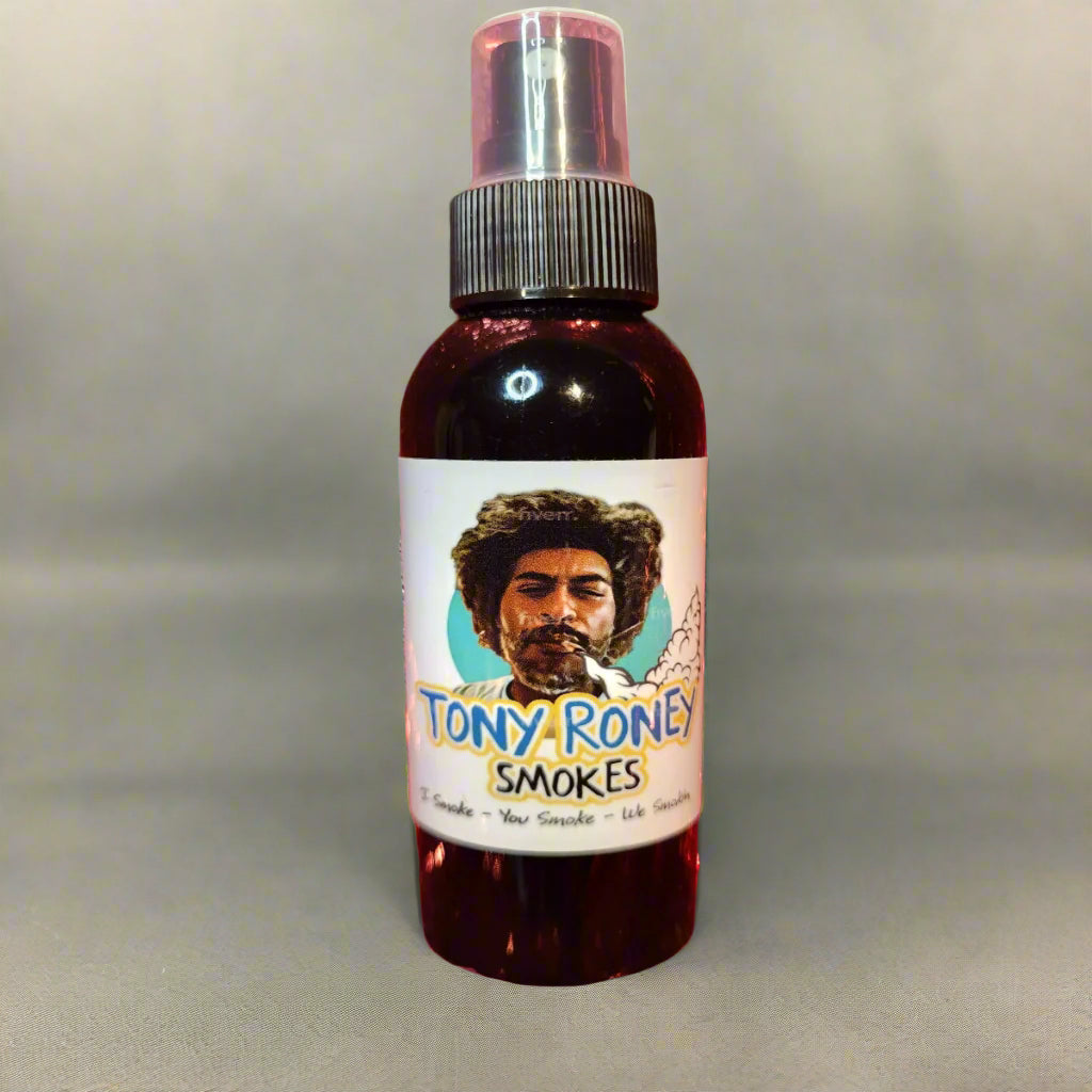 A room spray bottle with a label that says TONY RONEY SMOKES ODOR ELIMINATOR SPRAY – Lemon, Eucalyptus, Warm Musk, and Citronella.