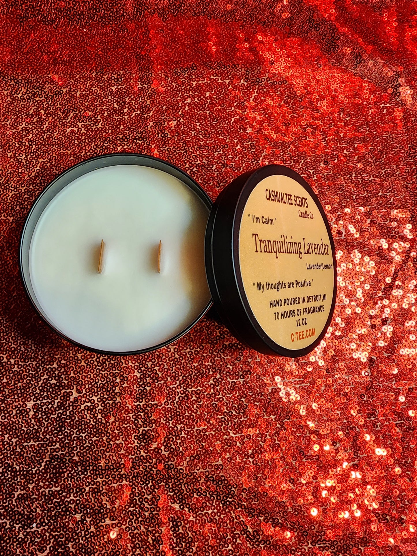 A candle with a label that says TRANQUILIZING_LAVENDER_lavender_lemon