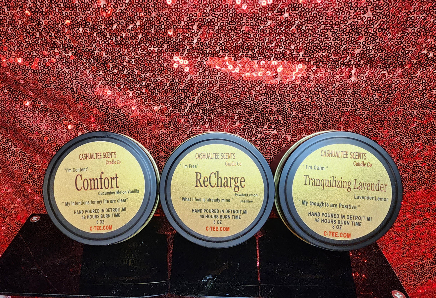 a candle collection with labels that has affirmations and manifestations on the label
