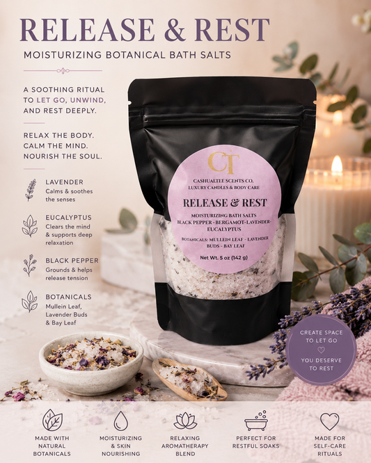 A black stand-up pouch of botanical bath salts labeled 'Release & Rest' by Carefabet Scents Co, displayed on a styled spa-like surface with lavender buds, a candle, and printed product information around it.