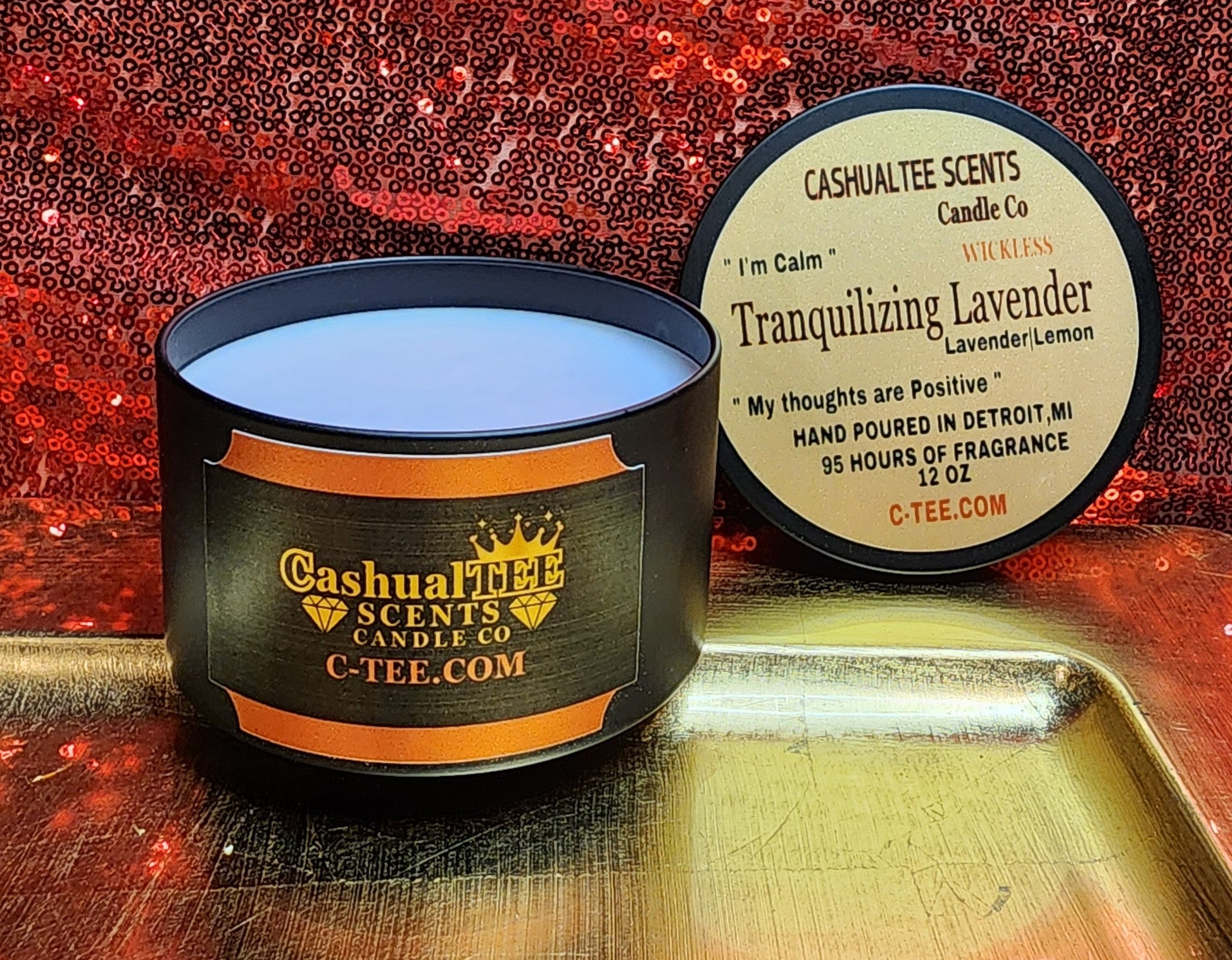 a candle with a label that says TRANQUILIZING LAVENDER WICKLESS CANDLE – Lavender _ Lemons